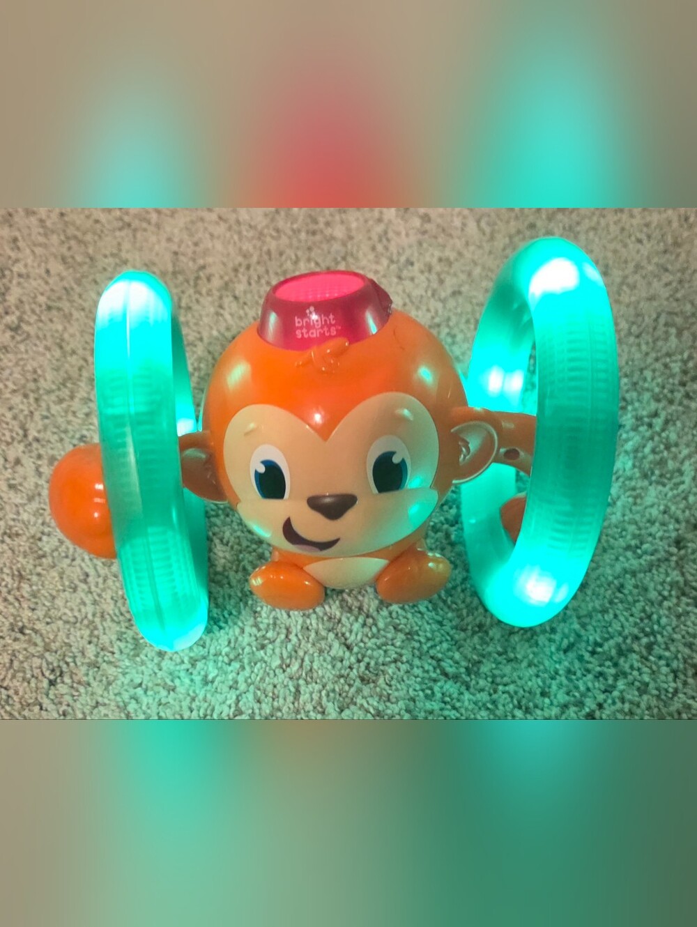 Bright Starts Orange Light-Up Monkey Push Toy for Kids